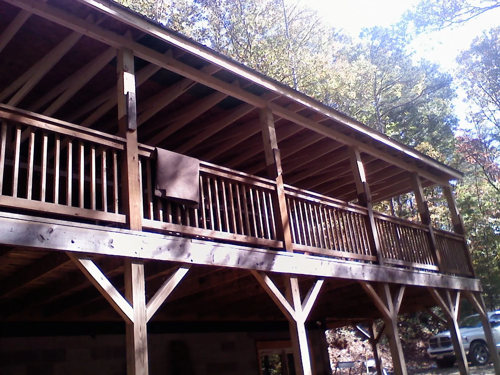Timber framing under a new elevated porch and deck — Roof Leak Repair in Pine Bluffs by Roofing Brothers